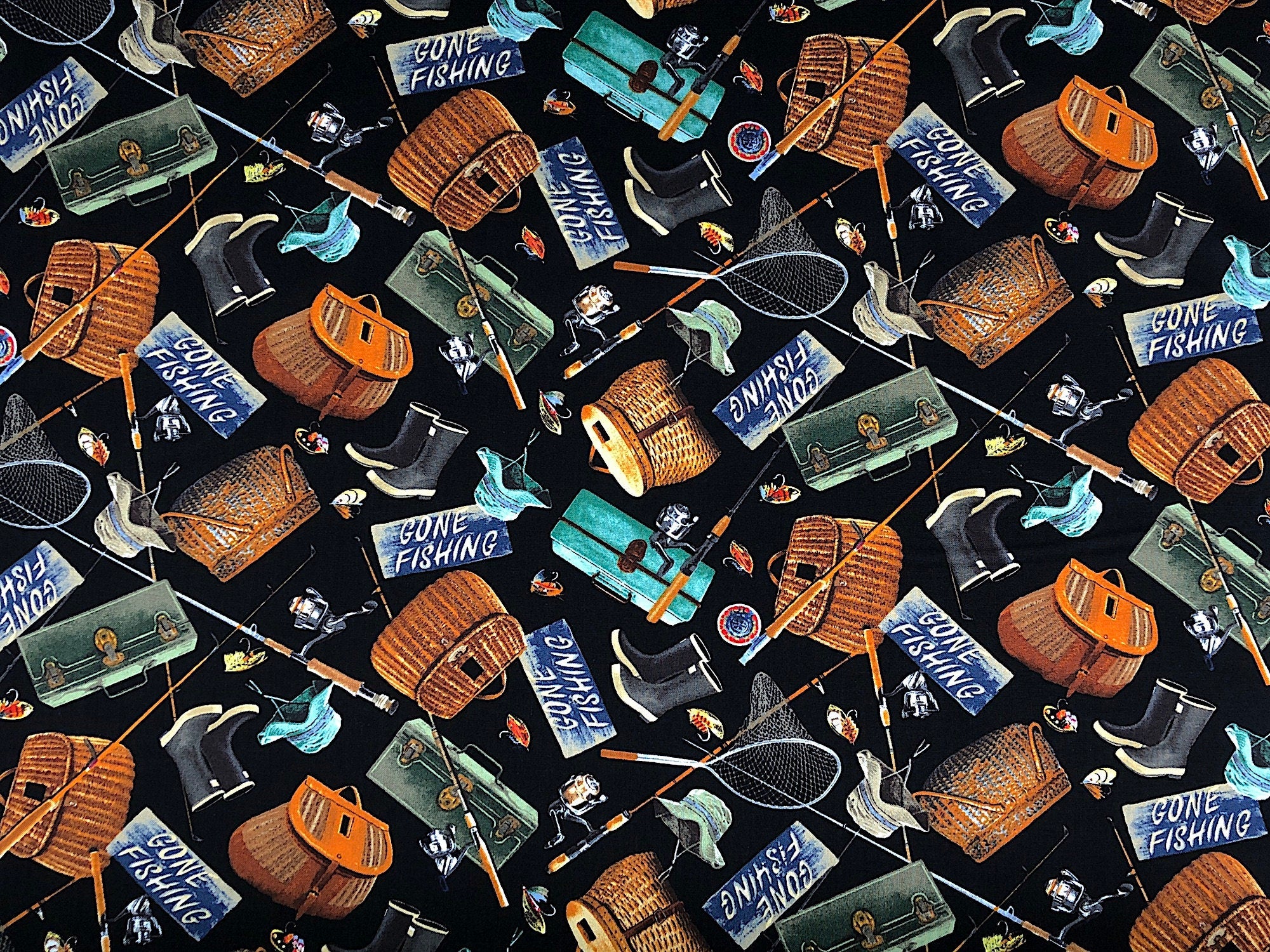 This fabric is called Fishing Gear and is covered with tackle boxes, fishing poles, fishing hats, nets, boots, fish baskets and Gone fishing signs. The background is black.