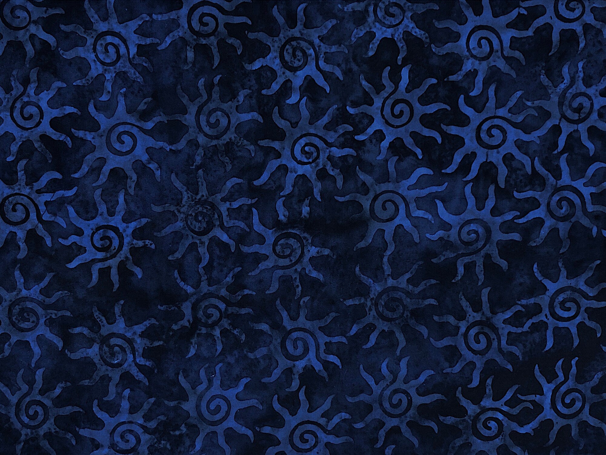 This fabric part of the American Frontier Collection. The Blue fabric is covered with sun shapes.