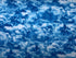 This fabric is covered with blue and white clouds.