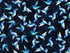 This fabric is a called Tossed Hummingbirds and is part of the Midnight Sapphire collection by Barb Tourtillotte. Light blue hummingbirds are tossed all over a dark blue background.