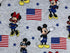 Close up of Mickey and Minnie and USA Flags.