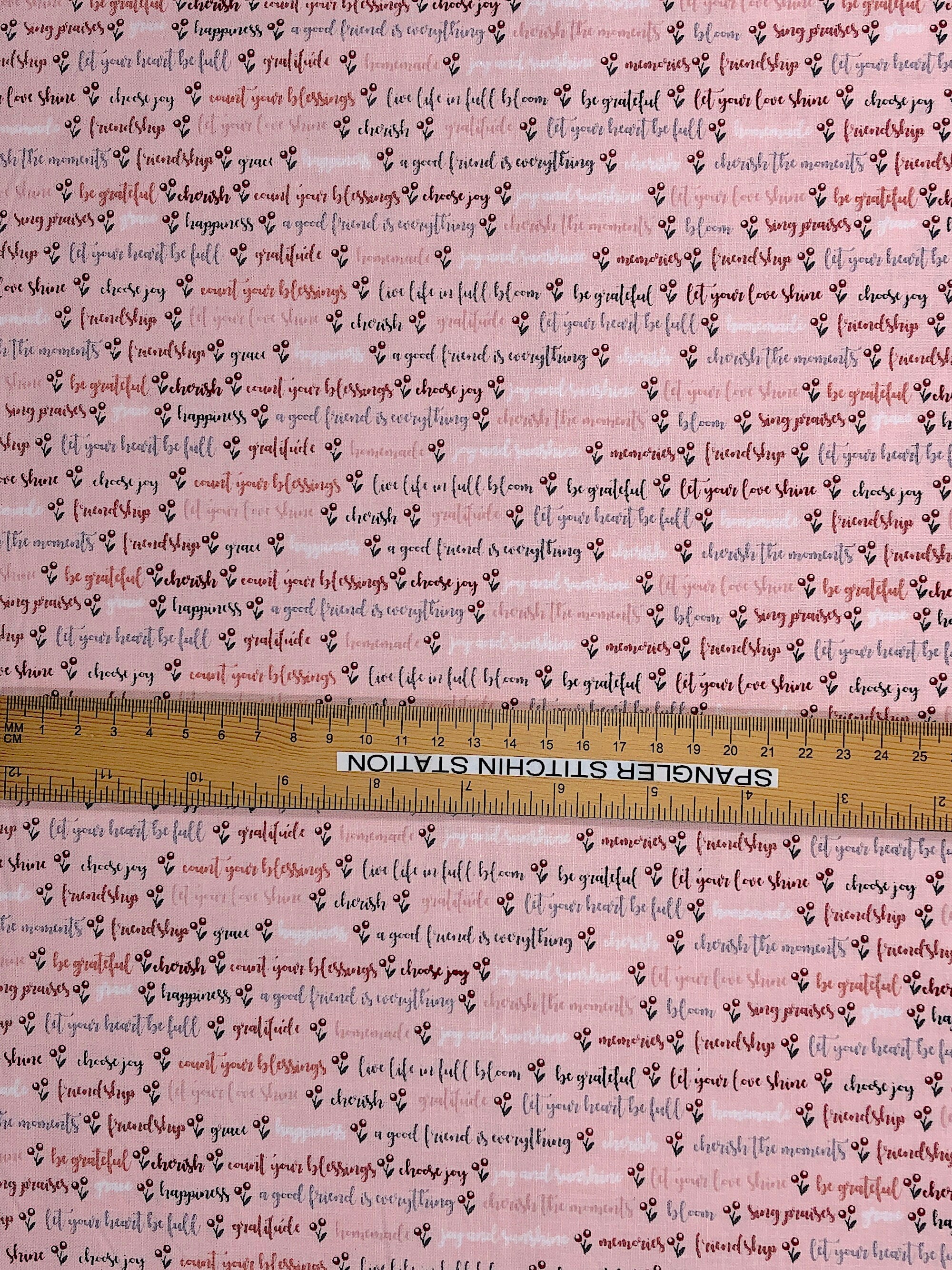 Ruler on fabric to show width.