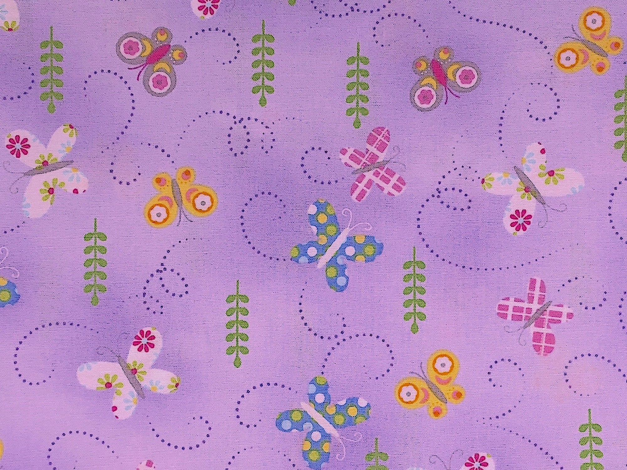 Butterflies on lavender fabric