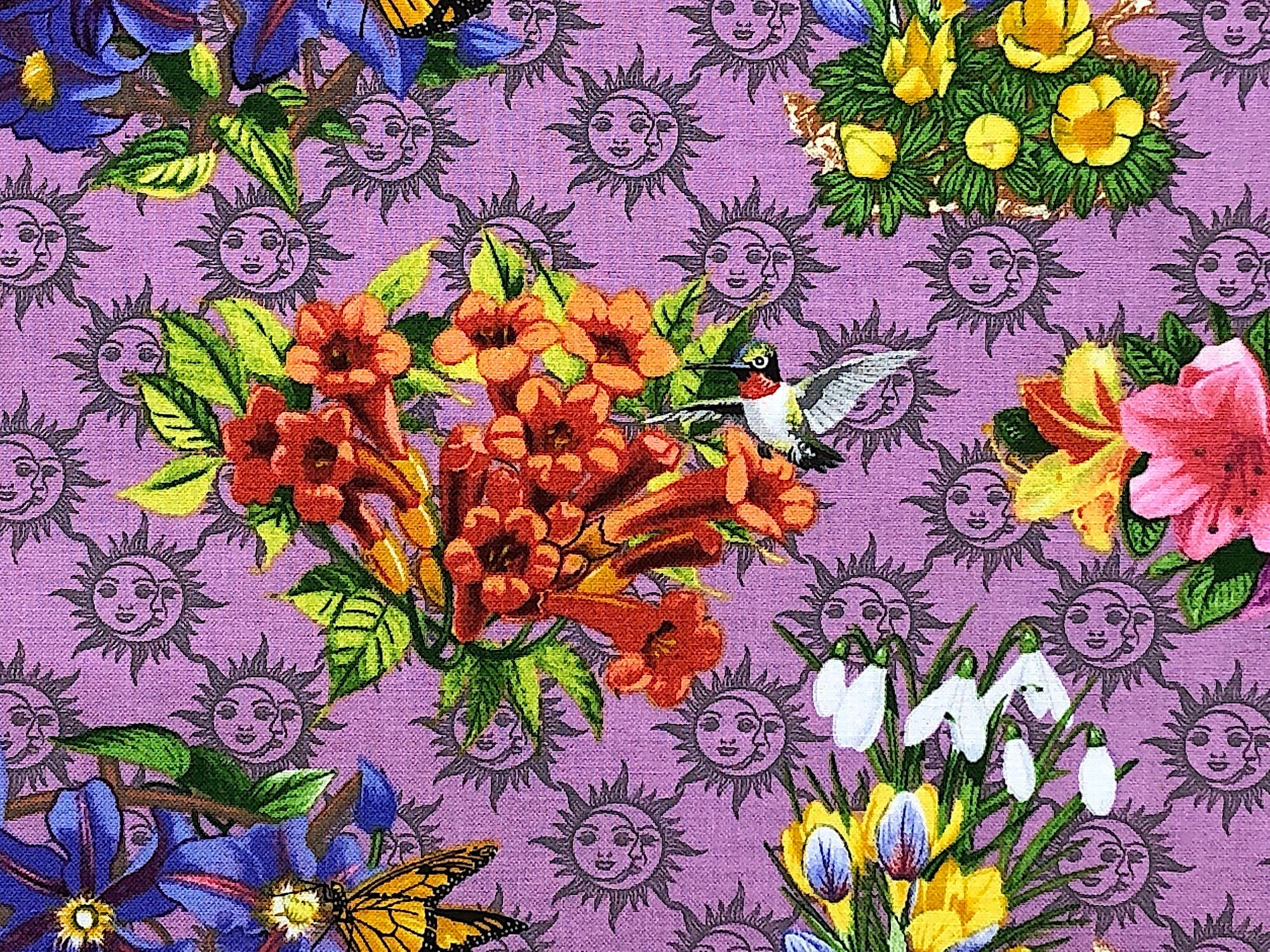 This fabric is called Floral Sundial and is covered with lilies, sunflowers, sun drops, butterflies, hummingbirds and more. This fabric is part of the Old Farmers Almanac collection by Print Concepts.