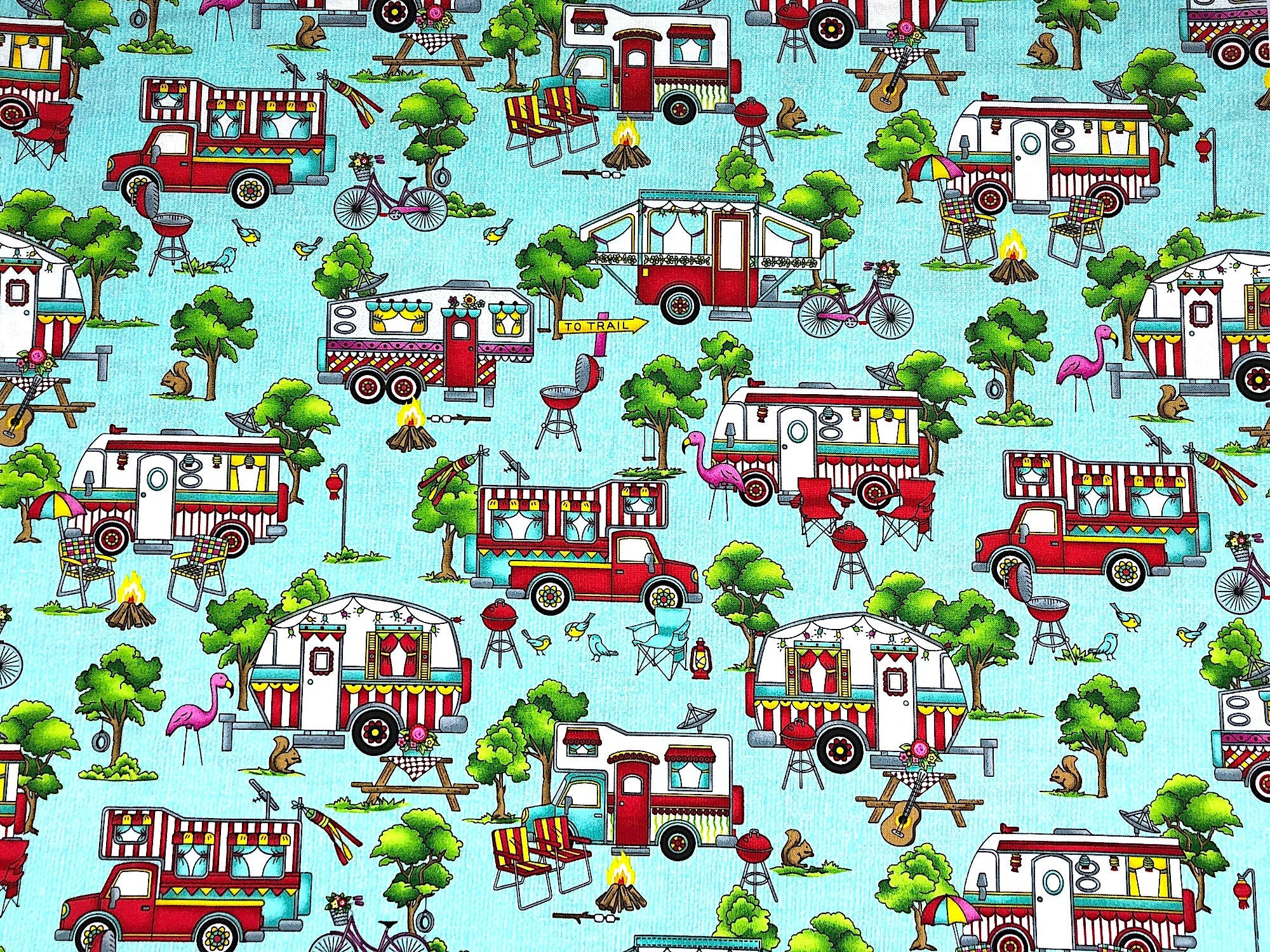 This fabric is called landscape and is covered with travel trailers, campers on trucks, 5th wheels pop up tents, trees, lawn chairs, grills, birds, trees and more.