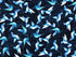 This fabric is a called Tossed Hummingbirds and is part of the Midnight Sapphire collection by Barb Tourtillotte. Light blue hummingbirds are tossed all over a dark blue background.