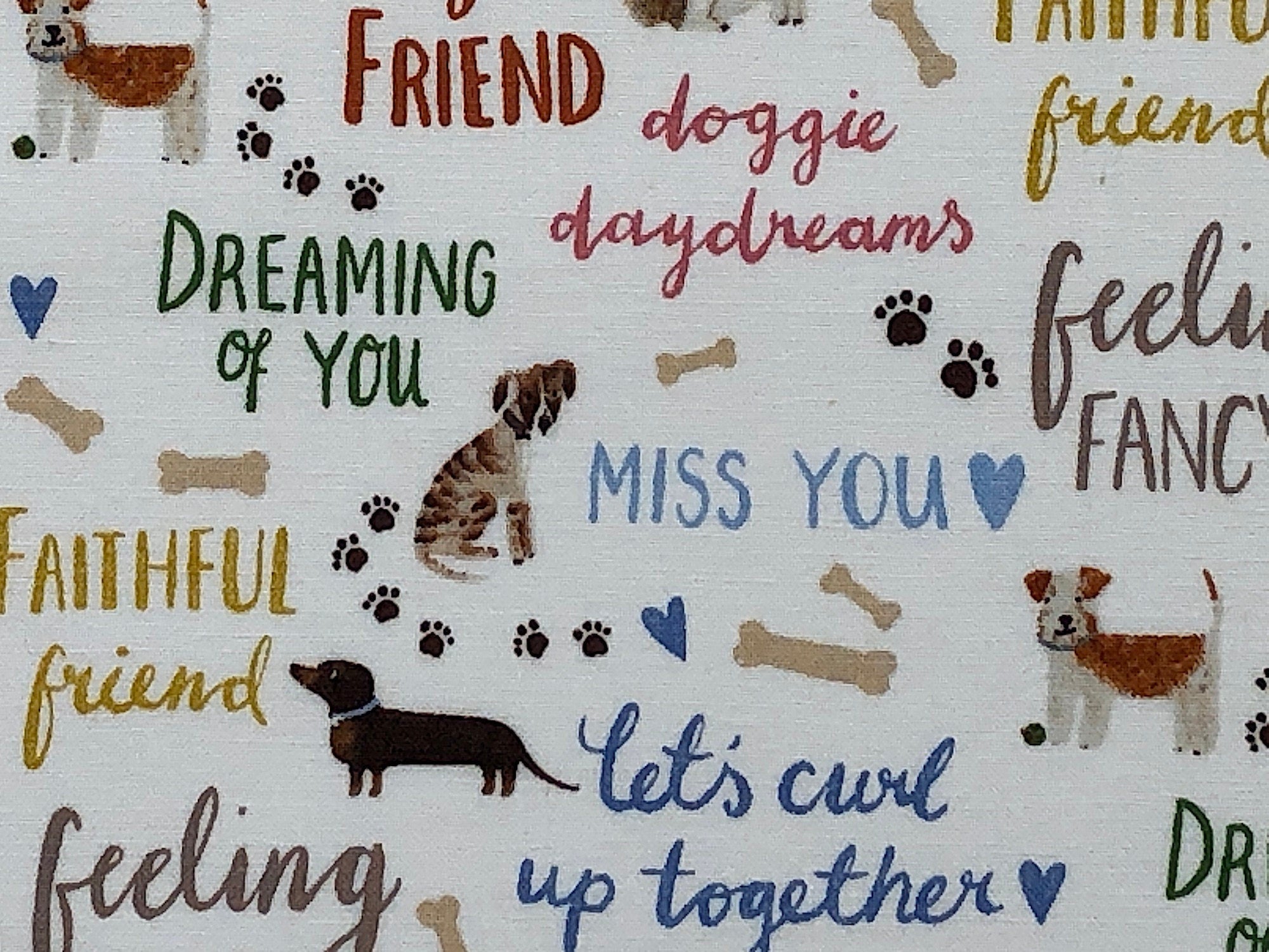 Close up of sayings such as dreaming of you, miss you and doggie daydreams.