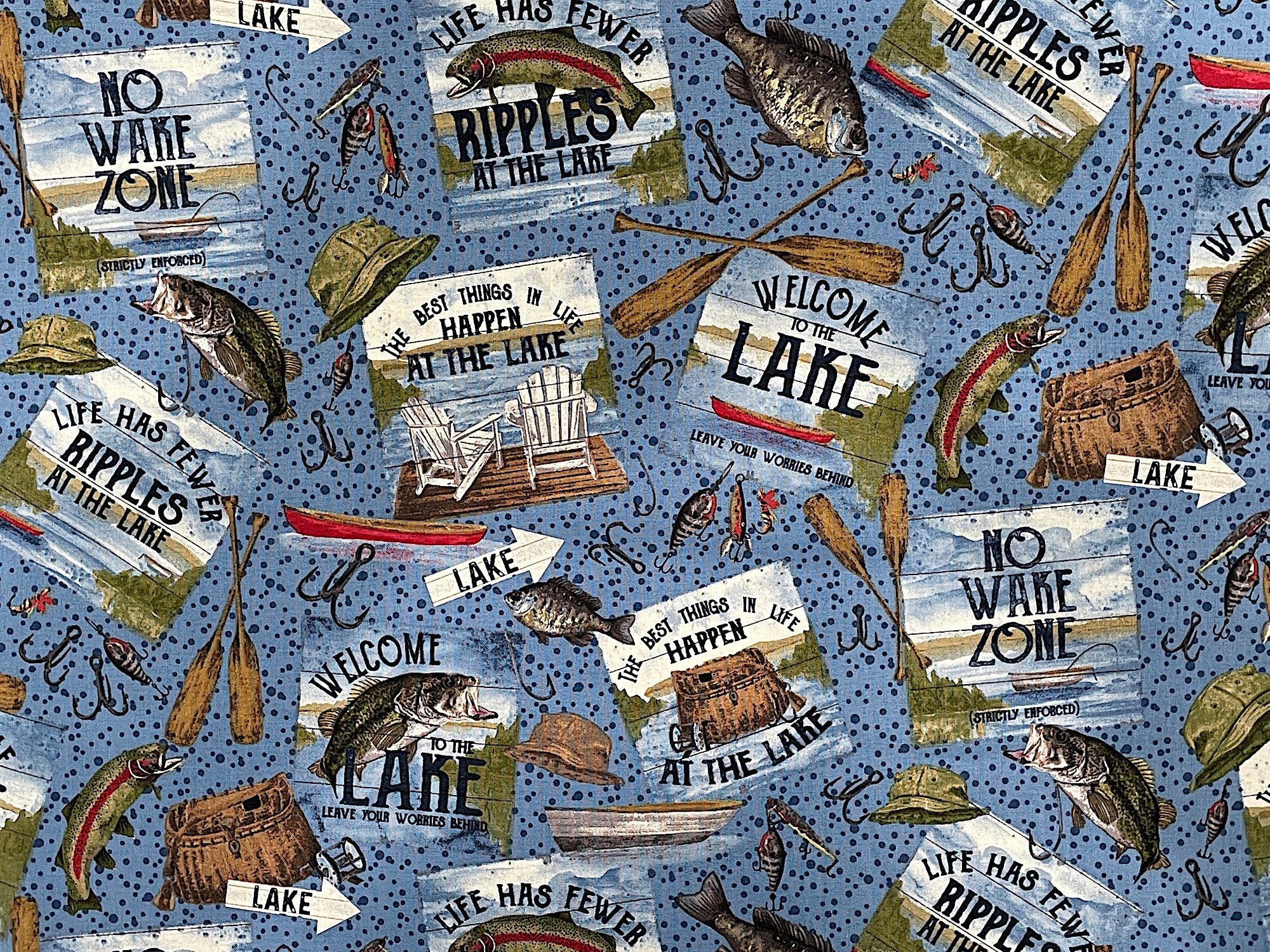 This fabric is part of the At the Lake collection from Riley Blake. This blue fabric is covered with fishing signs, fish, boats and more. Some of the sayings on the signs are Welcome to the Lake Leave Your Worries Behind, the Best Things happen at the lake and more