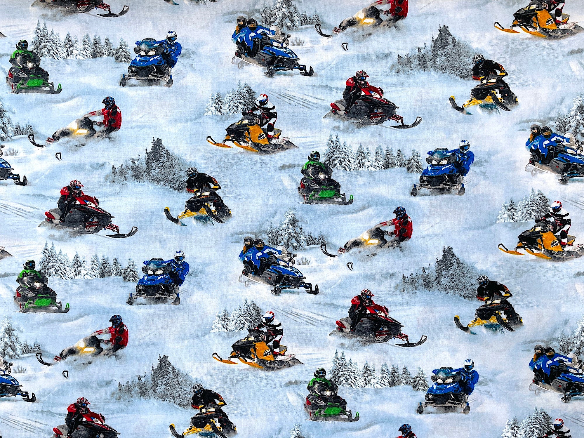 Cotton fabric covered with snowmobiles in the snow