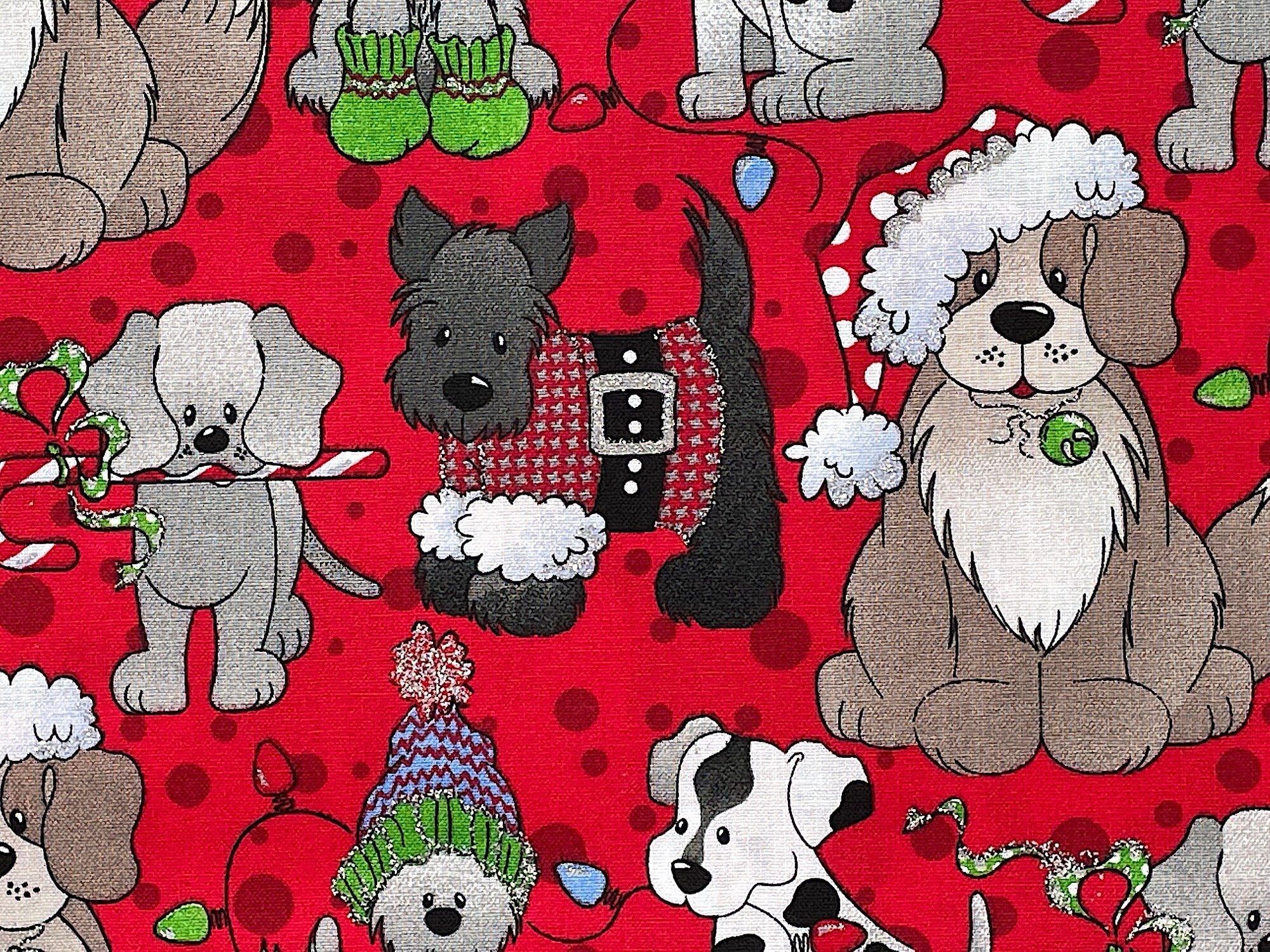 Here is an adorable Christmas themed dog fabric. It has cute small and large dogs with some wearing Xmas hats and holding a string of Christmas lights in their mouth. The Scottie dog wearing a red and gray check sweater, and the gray puppy has a candy cane in his mouth.