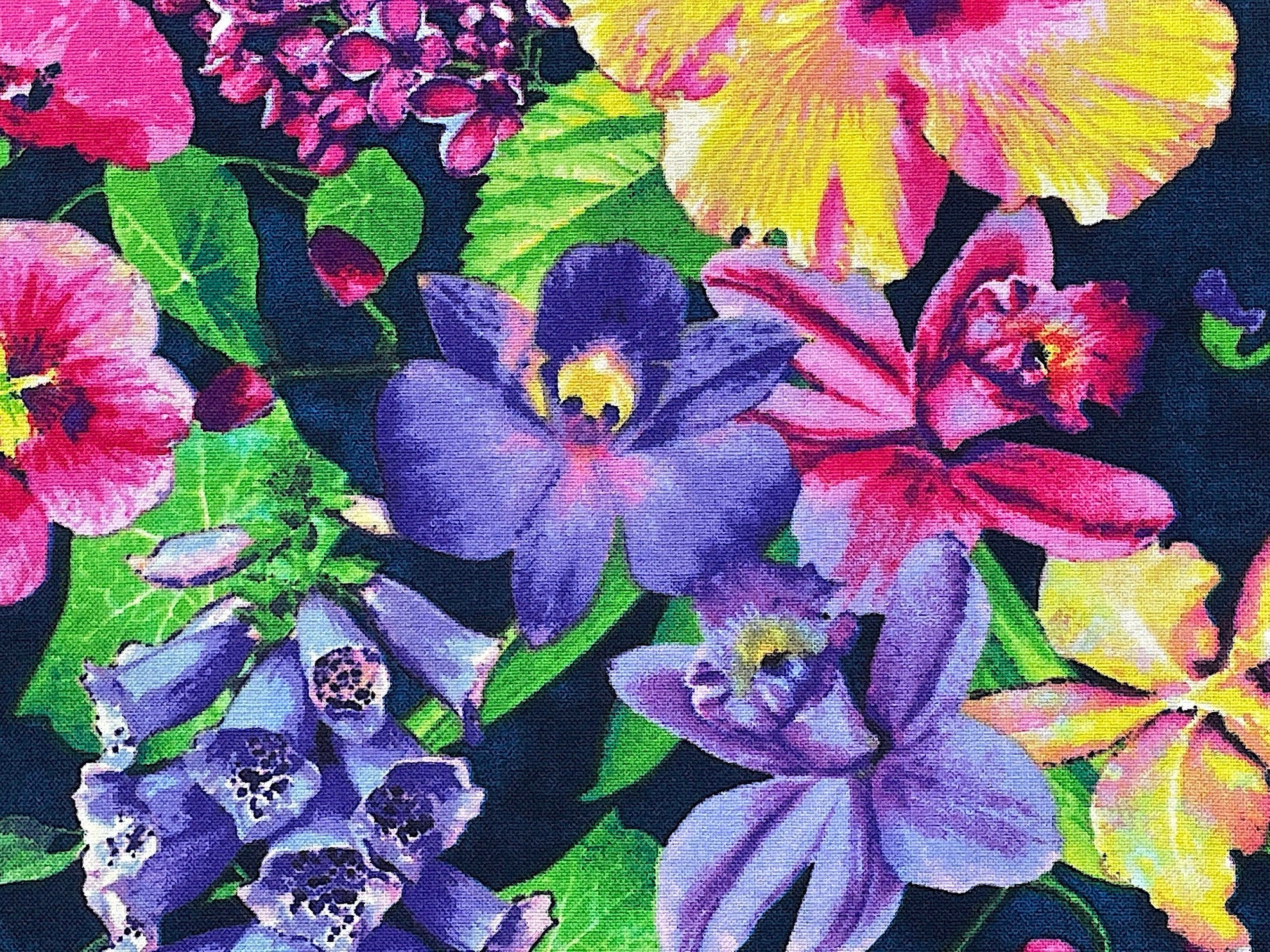Close up of clematis, hibiscus and other flowers.