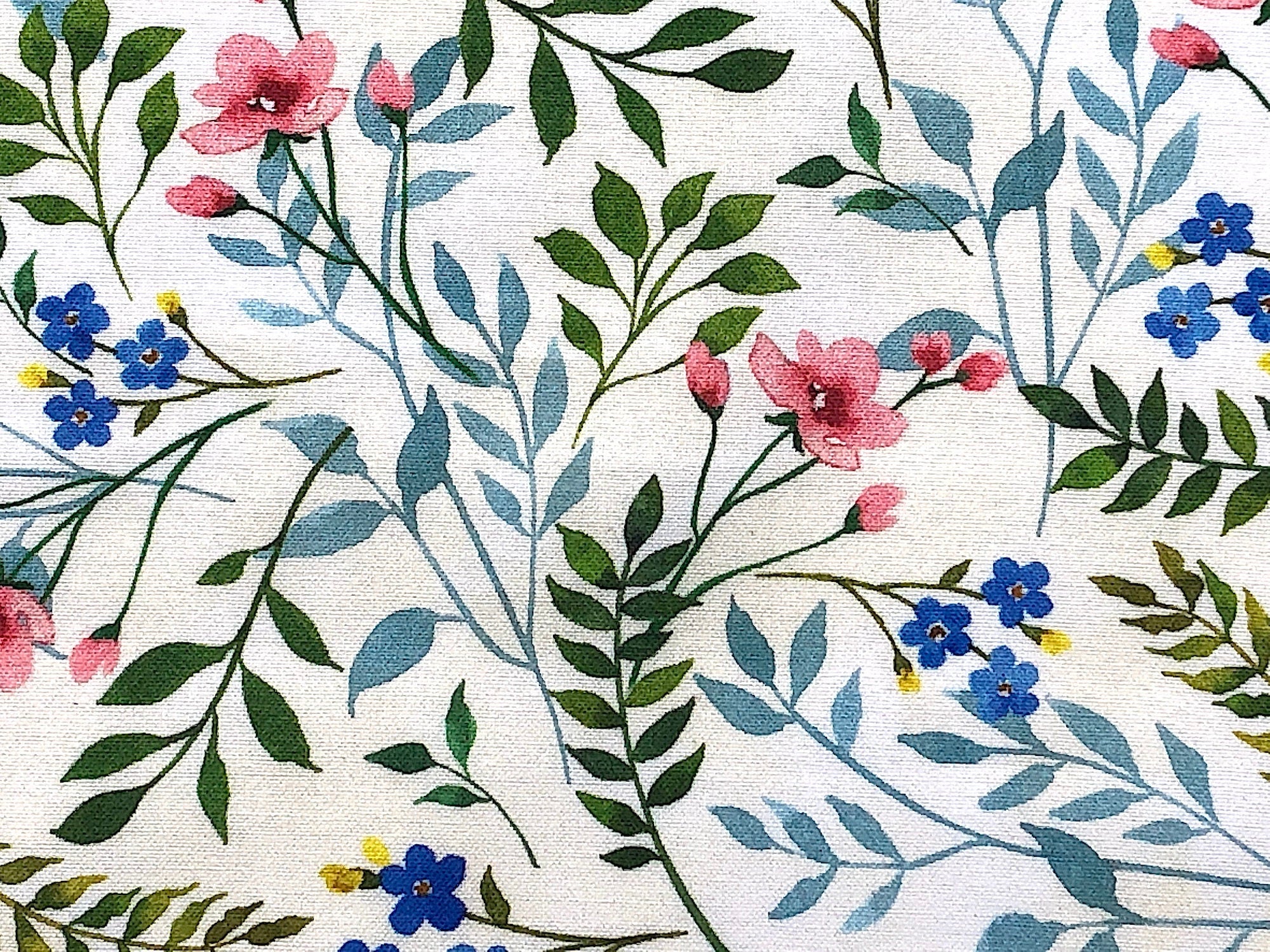 This pretty fabric is one from the Wildflower Farm Collection. Artist Jane Maday focuses on wildflowers in this collection. The colors are soft and cozy. This design has Pink, Blue, & Yellow Wildflowers - on a light Background.
