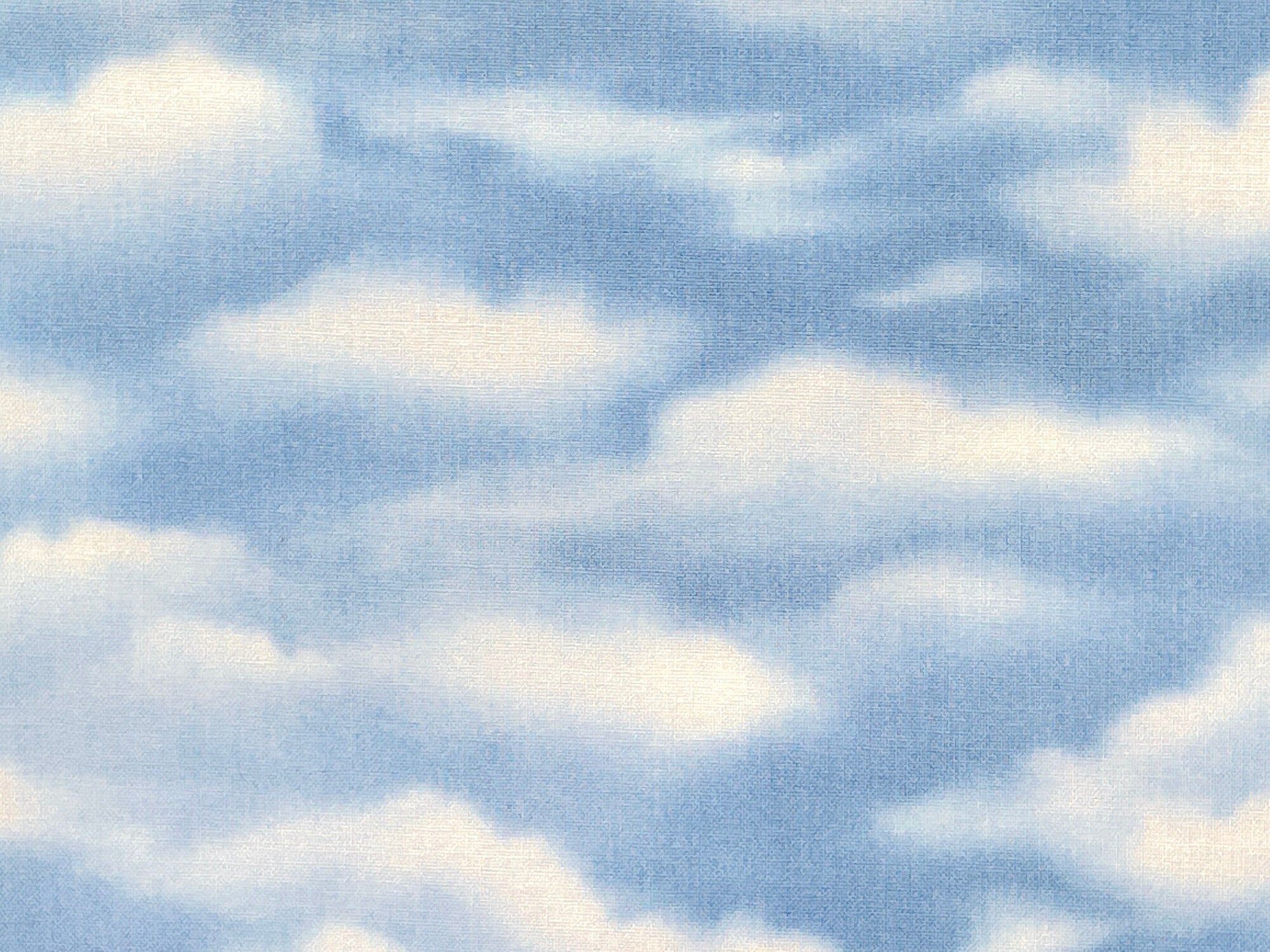 Close up of white clouds in the blue sky.