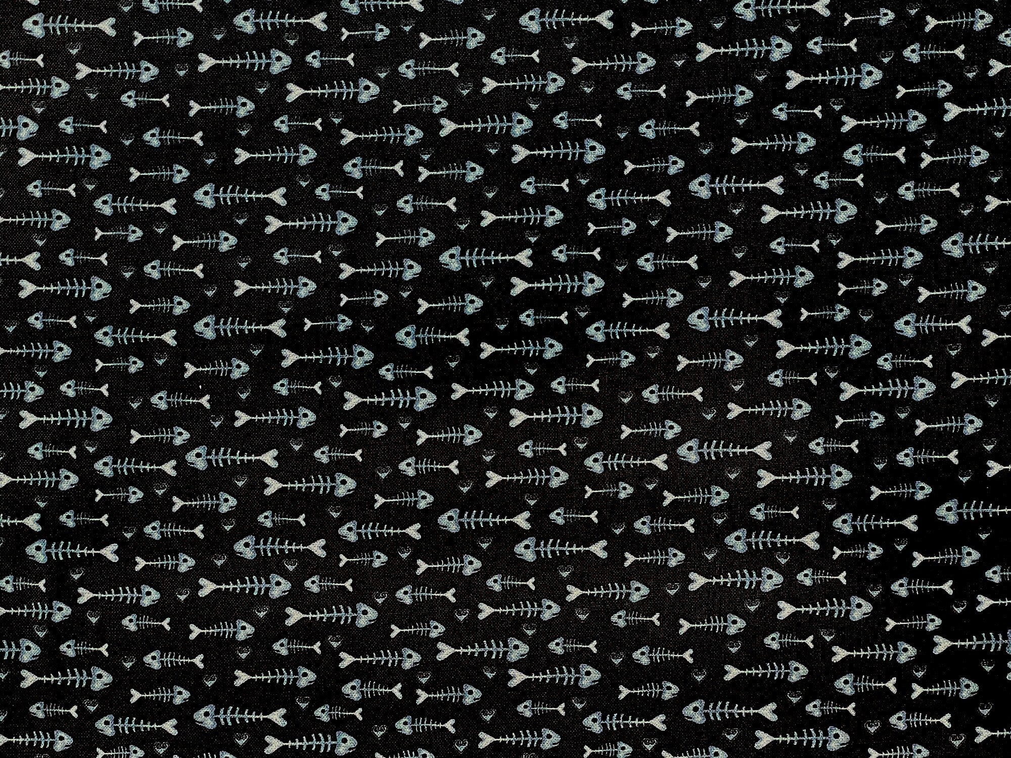 This black fabric is covered with fish bones. This fabric is part of the Kitty City collection by Andi Metz.
