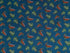 This fabric is covered with fish. Some of the fish are green and others are green, yellow, white and orange. This fabric is part of the Lake Adventure collection by Wilmington Prints.
