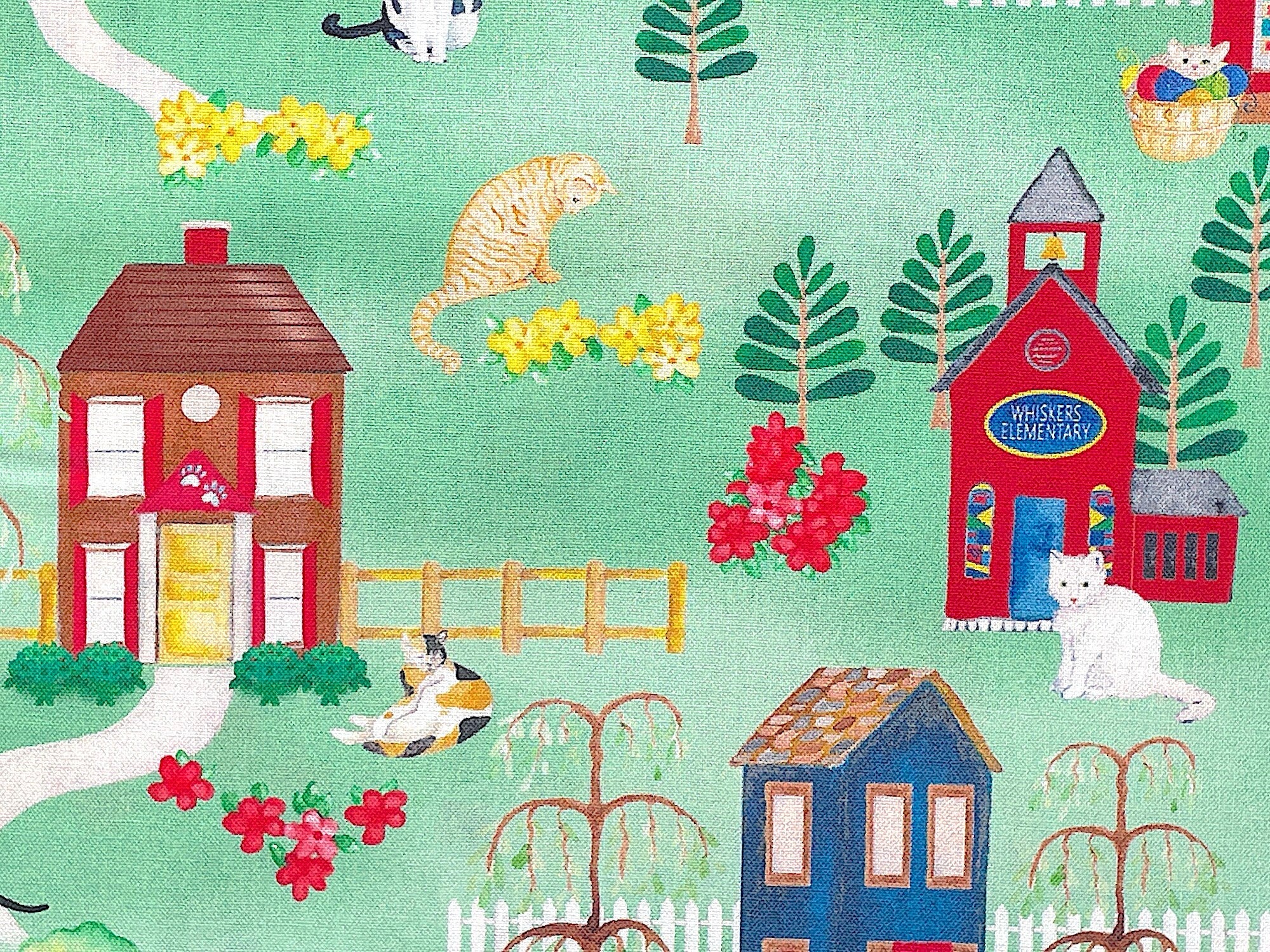 Close up of cats, buildings, trees and more.