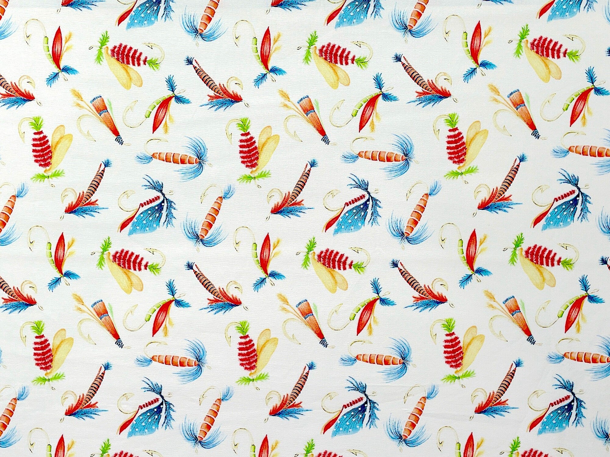 This is a collection of Fly Fishing Lures on a cream background