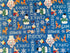 This blue fabric is covered with Rudolph and his friends which include Sam the snowman, Hermey the misfit elf and Bumble and snowflakes.