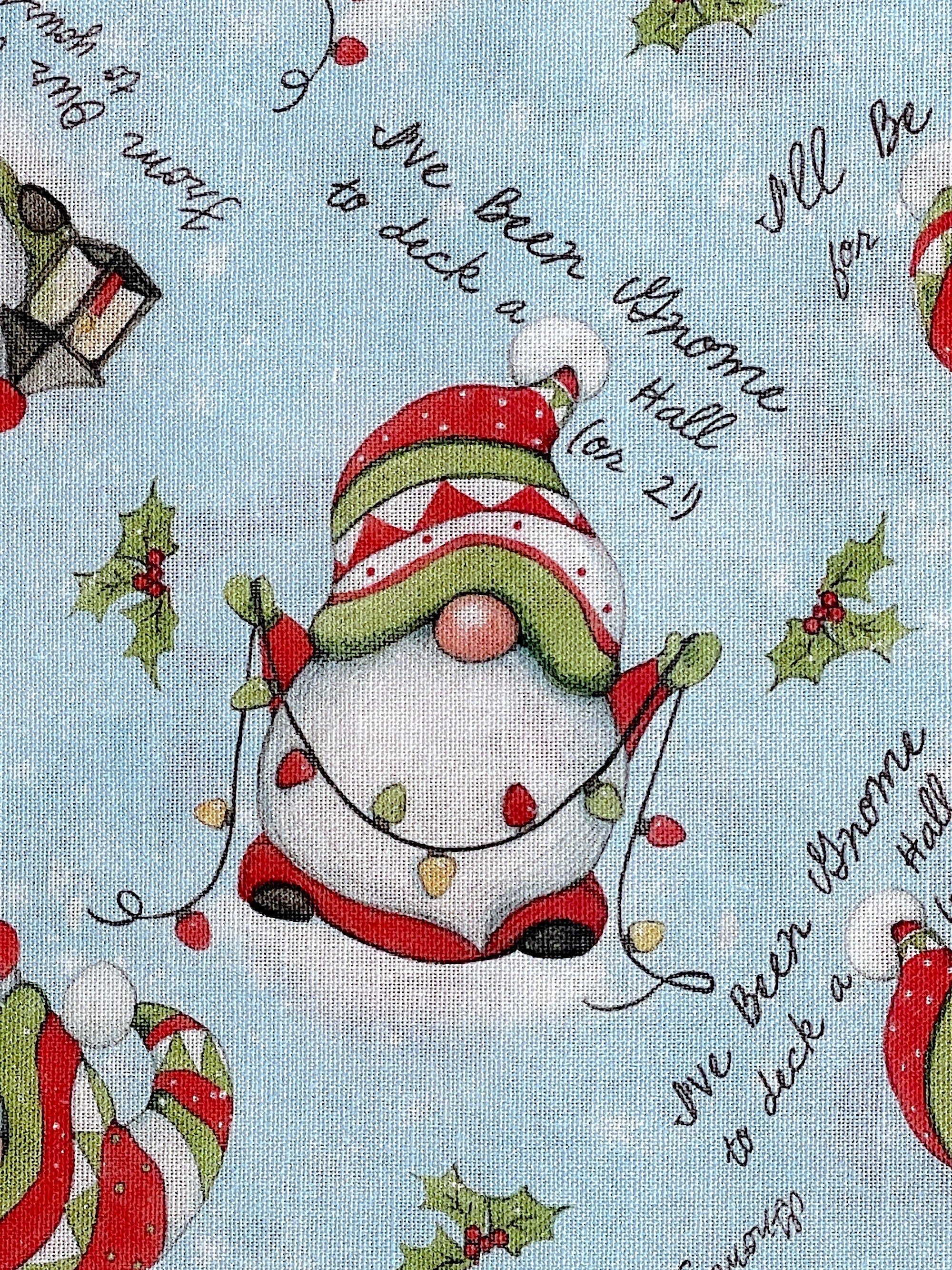 Close up of a gnome Santa and the saying I've been gnome to deck a hall or 2.