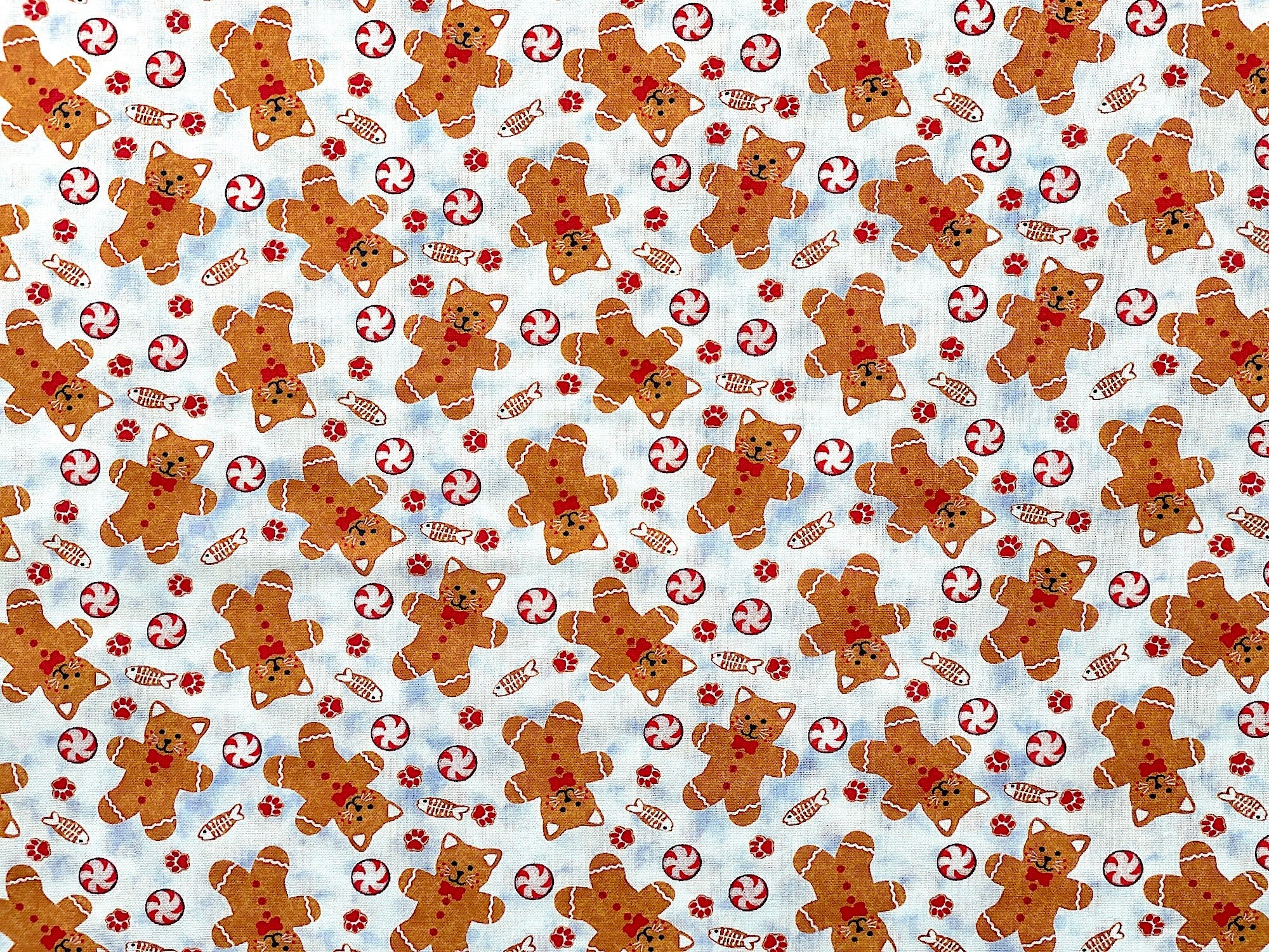 Kittens are one of the most popular pets in the world. This mischievous creature inspired Kayomi Harai’s next fabric collection for Studio e Fabrics. “Kitten Christmas” is a digital Christmas collection featuring cute kittens impersonating Santa Claus. This is the perfect holiday collection for the Cat lover. This design has sweet little Gingerbread kittens and Peppermint Candies