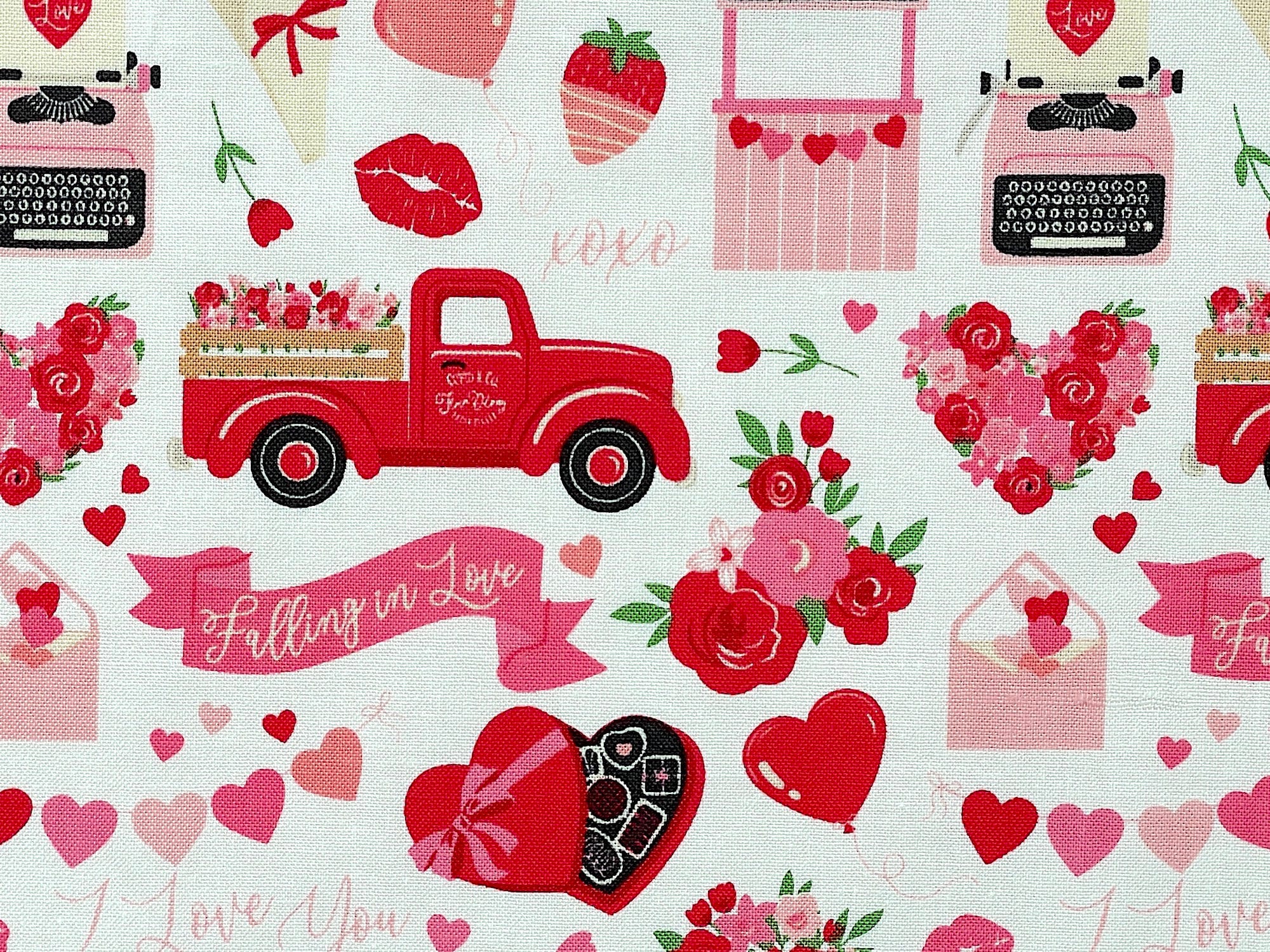 Close up of hearts, flowers, red truck, candy, lips and more.