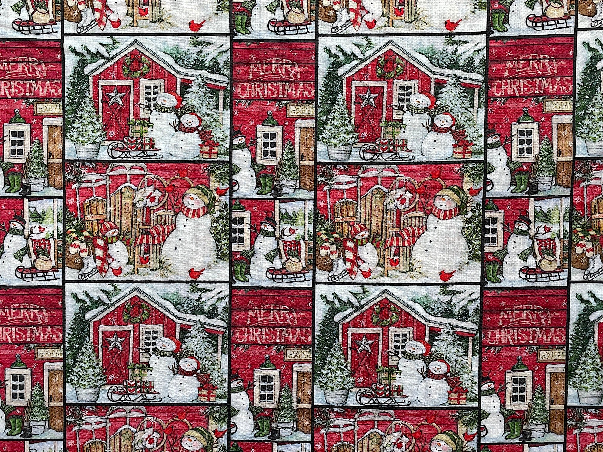 This fabric is called Santa's Lodge. This fabric is covered with buildings that say Merry Christmas. You will also find Snowmen, sleighs, trees and more.