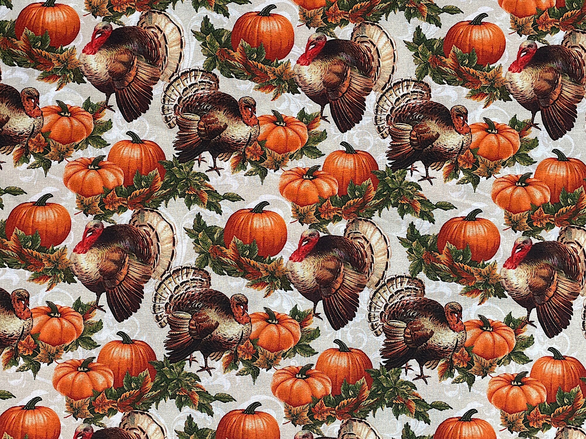 This cotton fabric is covered with turkeys and orange pumpkins. This fabric is part of the Turkey Time collection by Benartex