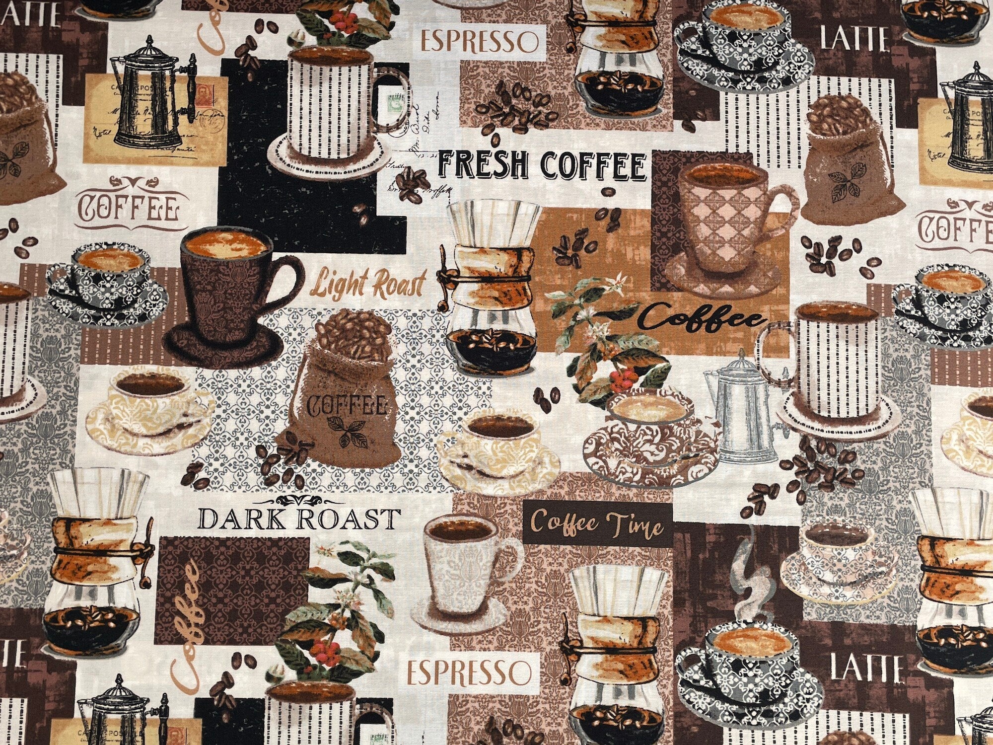 This fabric is part of the Coffee Connoisseur collection by Jean Plout and is called Cream Main Street Café Patch. This fabric is covered with coffee cups and mugs filled with coffee sitting on saucers, coffee beans, various coffee makers and more. You will also find coffee sayings such as coffee time, dark roast, light roast, fresh coffee and more