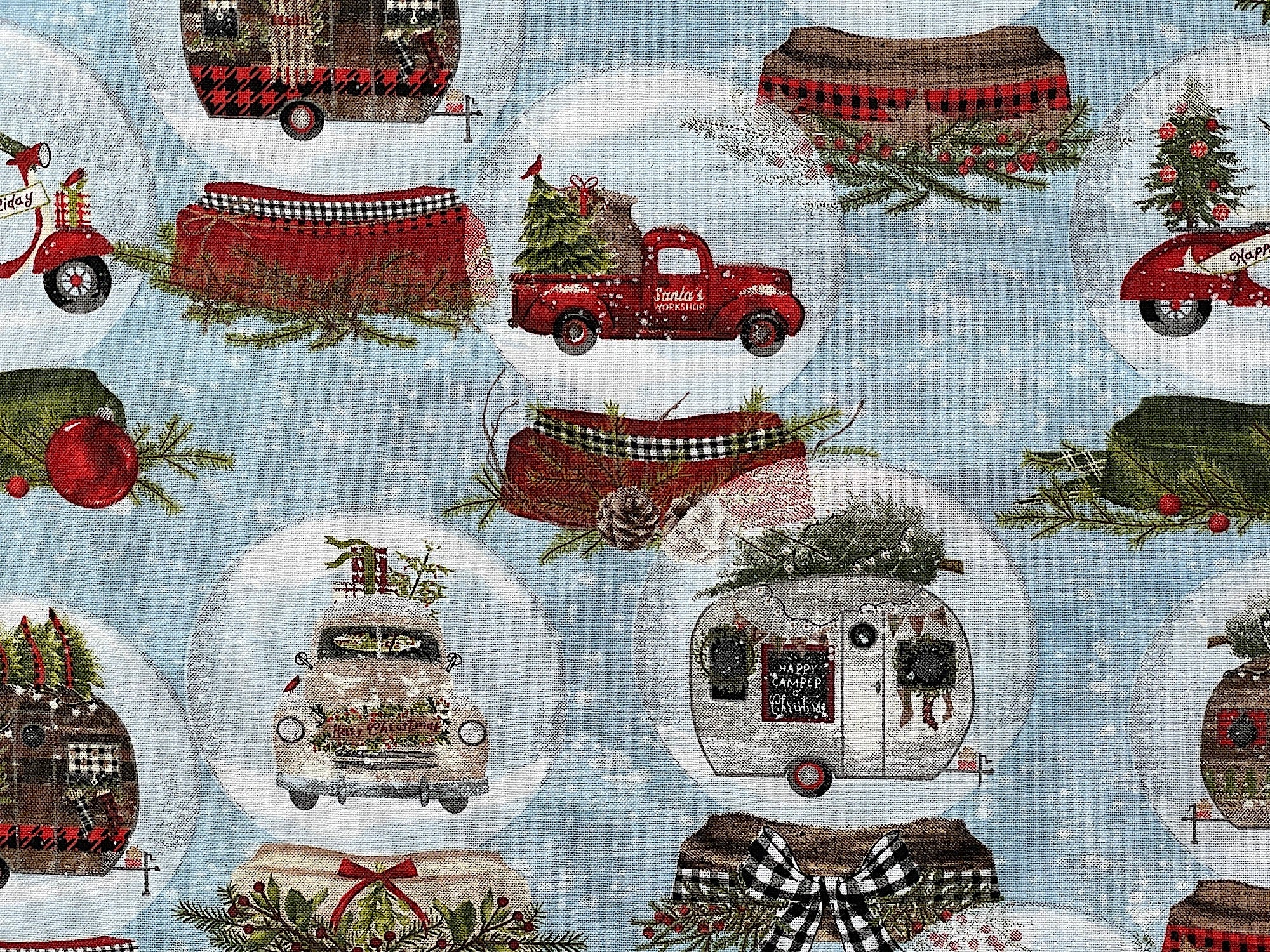 Close up of a red truck inside a snow globe.