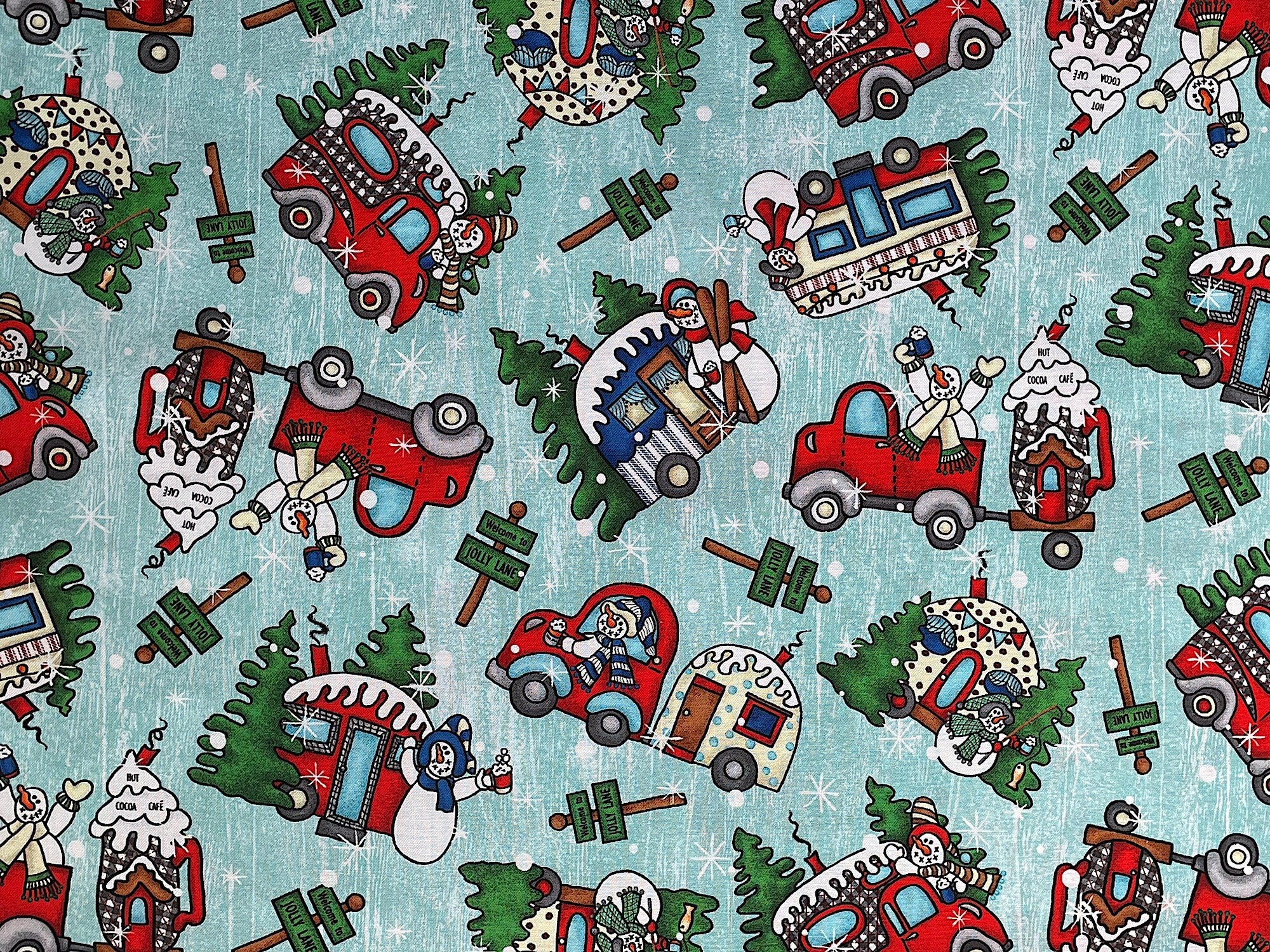 This cotton fabric is covered with snowmen, trees, travel trailers trucks and more. This fabric is called Jolly Lane and was designed by Pearl Krush.