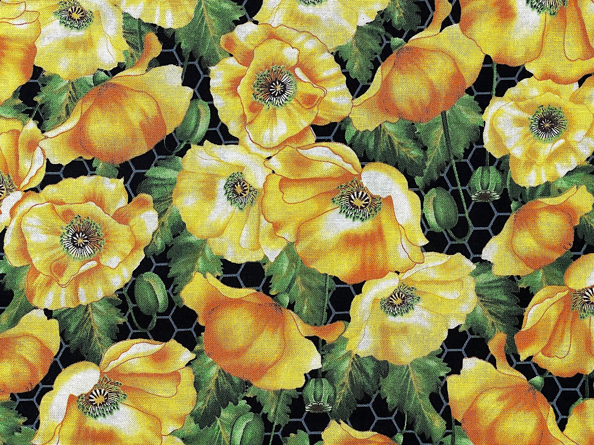 This flower fabric is covered with yellow poppies and green leaves
