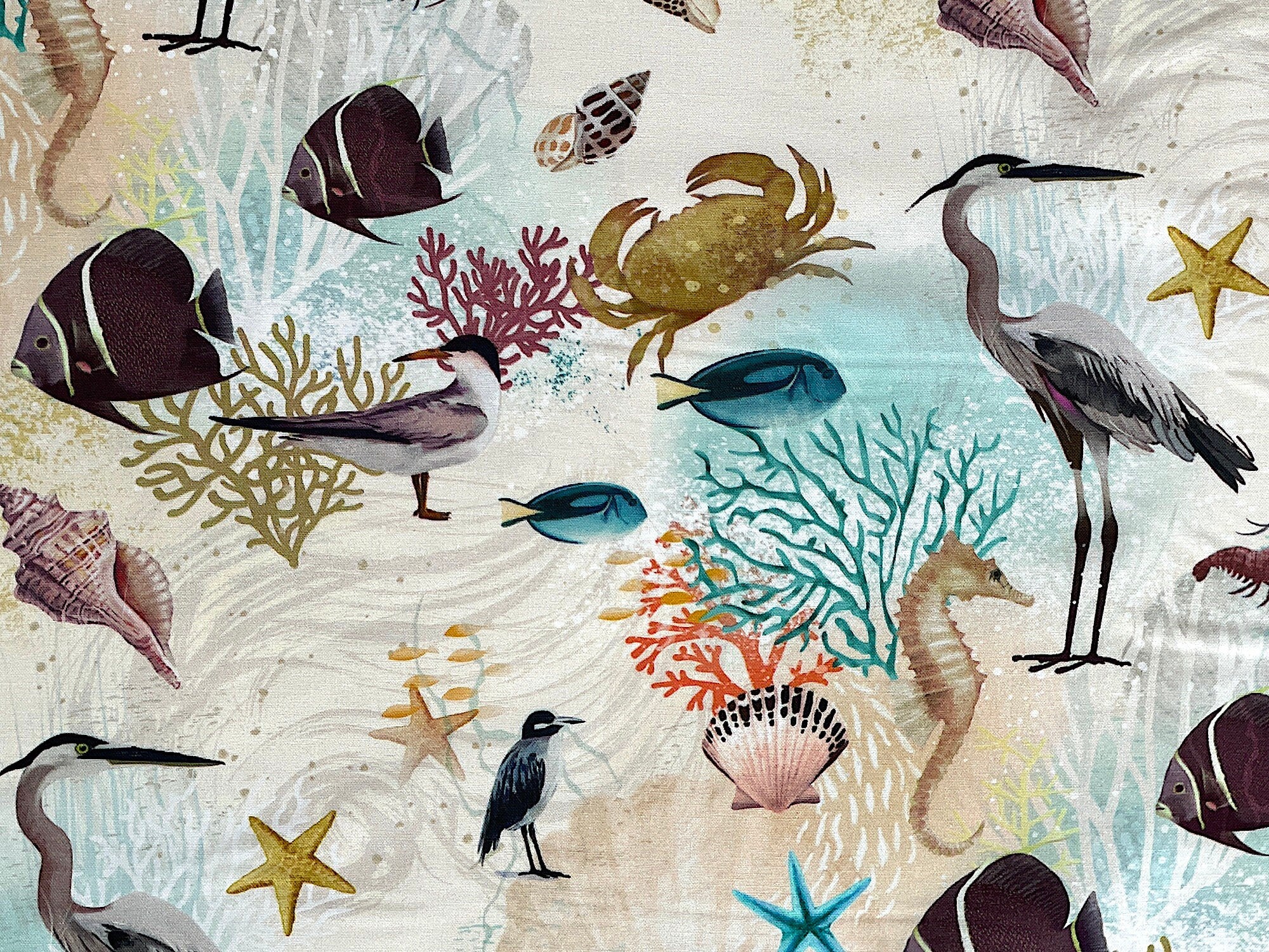 This fabric is called Sealife and is covered with fish, seashells, ocean plants, birds, seahorses, starfish and more. This fabric is part of the Seashell Wishes collection.