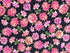 This black fabric is part of Tina's Garden collection by Tina Leto for Clothworks. This fabric is covered with dahlias in various shades of pink and green leaves.
