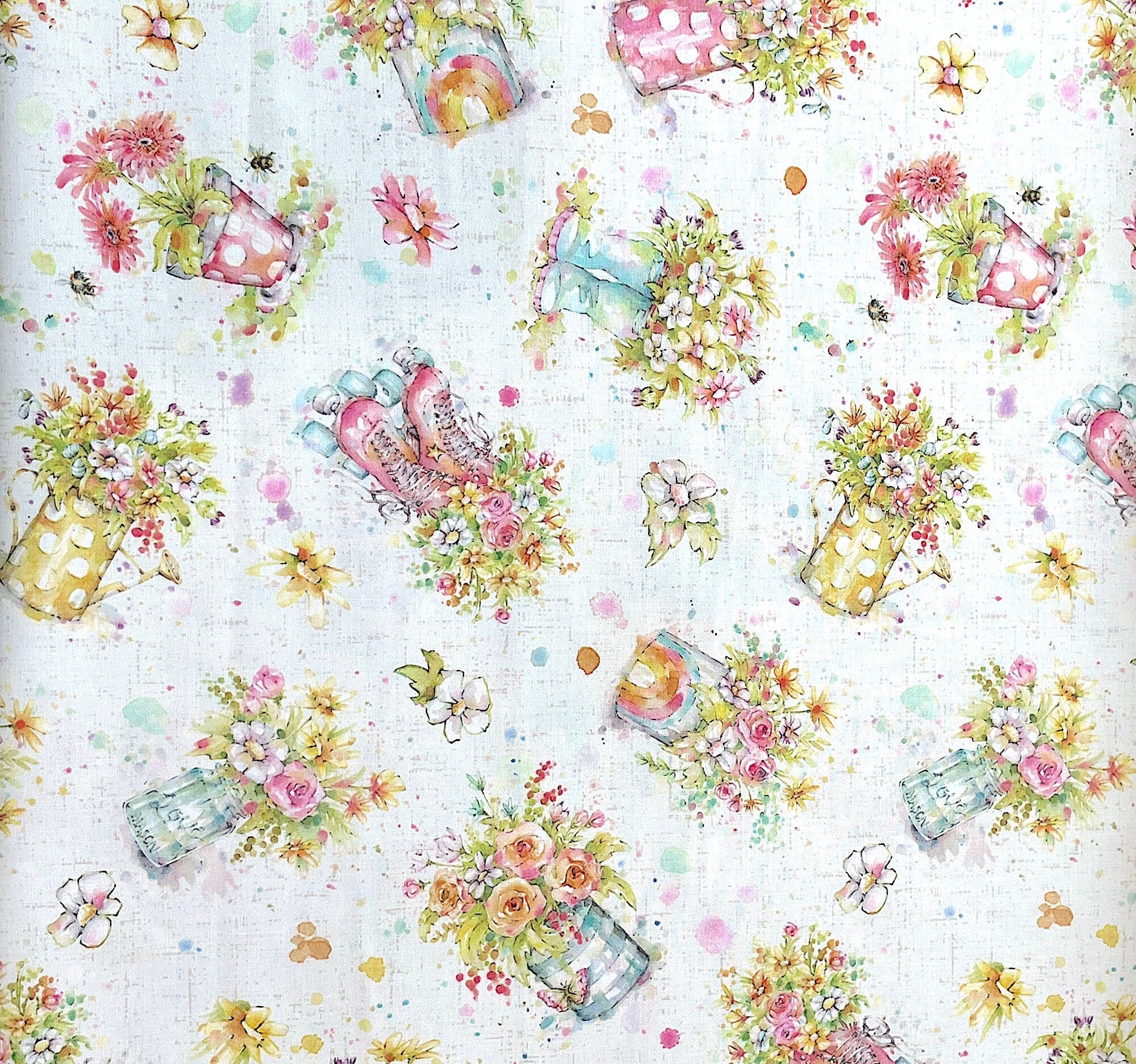 This off white cotton fabric is part of the Boots and Blooms collection by P&B Textiles. This fabric is covered with bouquets of flowers in roller skates, boots, watering cans, jars and pots.