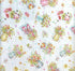 This off white cotton fabric is part of the Boots and Blooms collection by P&B Textiles. This fabric is covered with bouquets of flowers in roller skates, boots, watering cans, jars and pots.