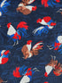 Close up of red, white and blue roosters on a blue background.
