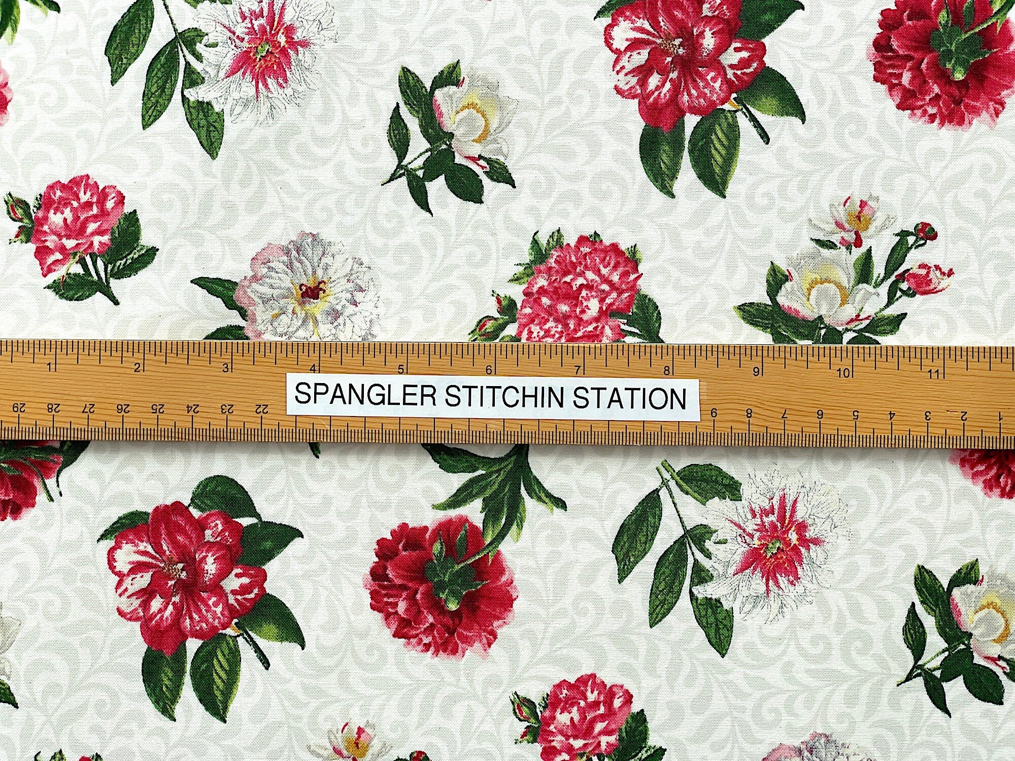 Ruler on fabric to show sizing.