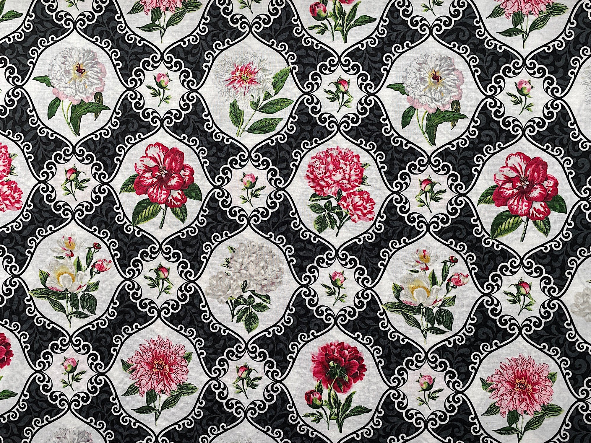 Black and White medallion fabric with red and white peonies inside of the medallions.