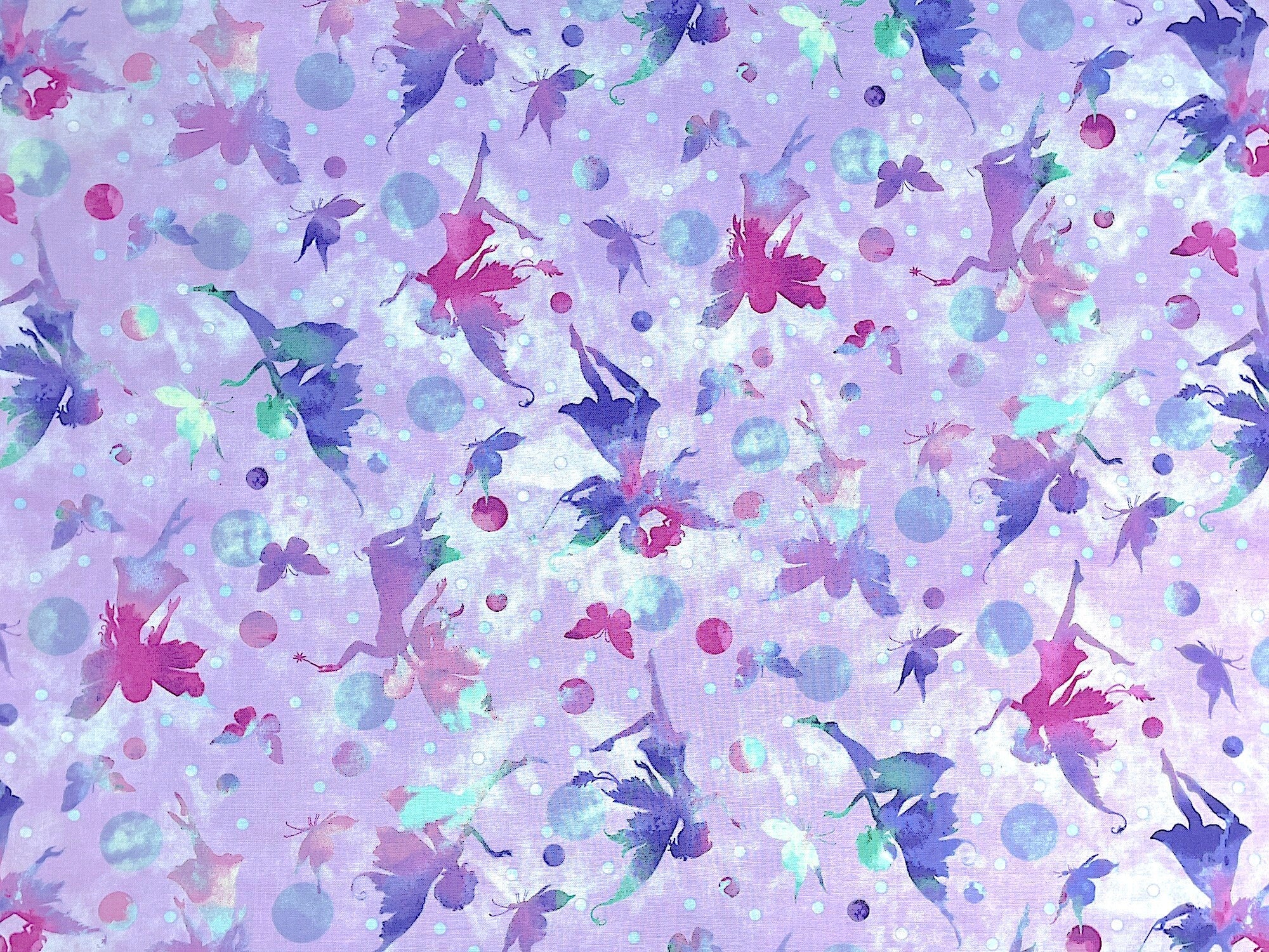 This fabric is part of the Fairytale Forest collection by Henry Glass. This lavender fabric is covered with fairy silhouettes.