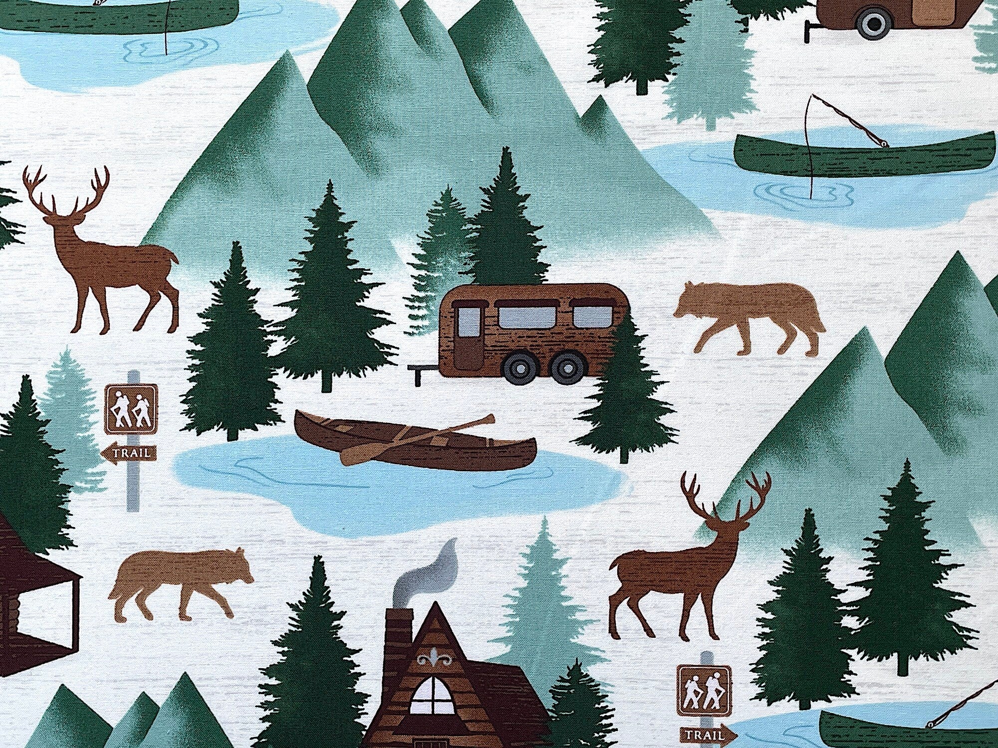 This fabric is part of the At the Cabin collection by Kanvas Studio. This fabric is covered with cabins, deer, trees, travel trailers, canoes and more.