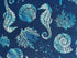 Close up of coral, seashells, and sea horses.