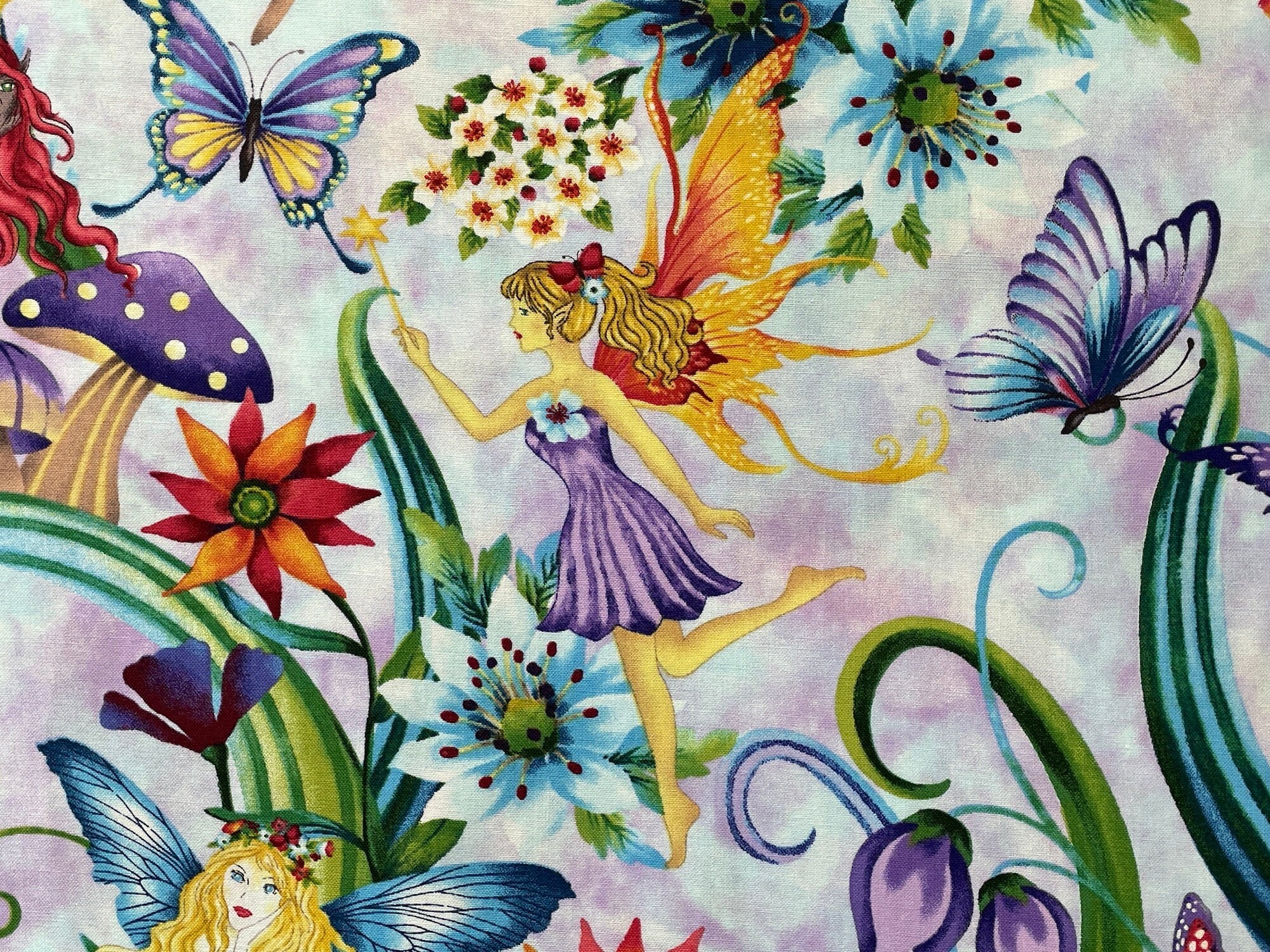 Close up of a fairy with a yellow star wand in her hand. She is wearing a purple dress and is surrounded by flowers and butterflies.