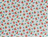 This white fabric is covered with small red and blue flowers and green leaves.