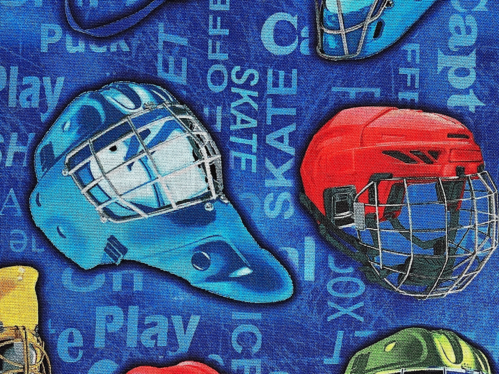 Close up of blue and red helmets.