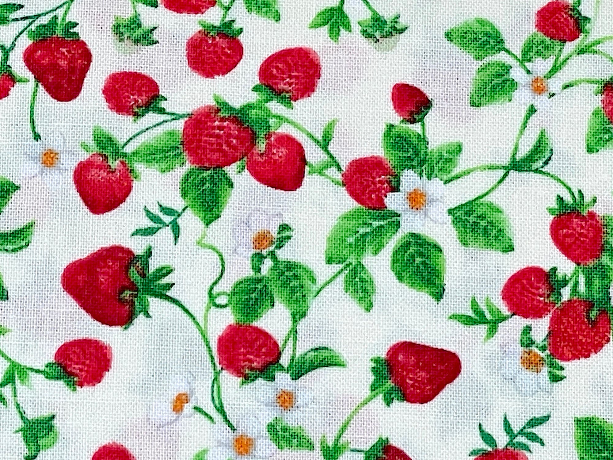 Close up of strawberries, leaves and flowers. 