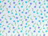 This fabric is part of the Full Bloom collection and is covered with turquoise, lavender and green tiny tulips. The white background is covered with white circles.