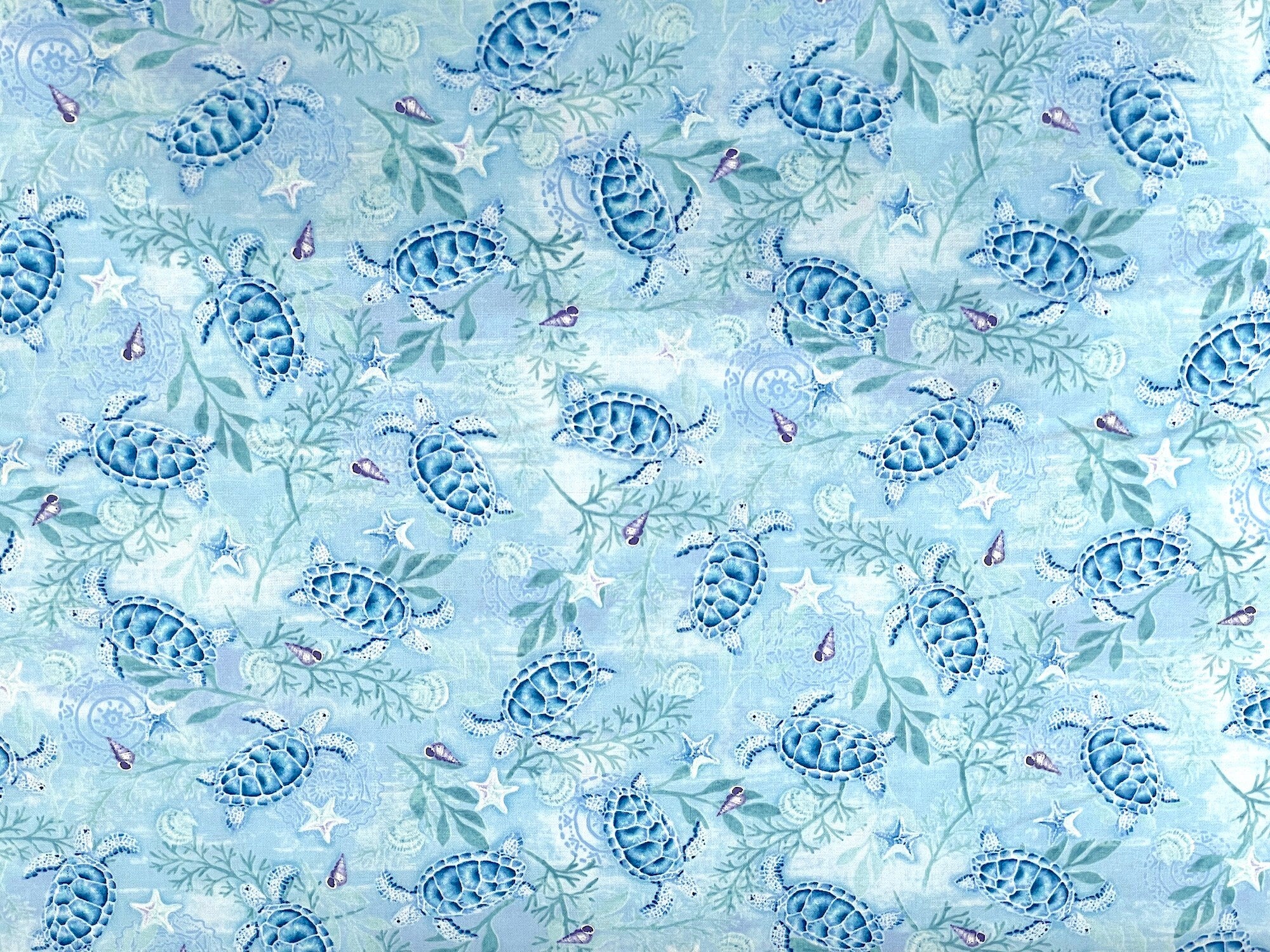 This light blue fabric is part of the Salt and Sea collection by Andrea Tachiera. This cotton fabric is covered with sea turtles. See my other listings for more fabrics from this collection as seen in the last picture and video.
