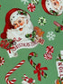 Close up of peppermint candy, snowflakes and Santa Claus.
