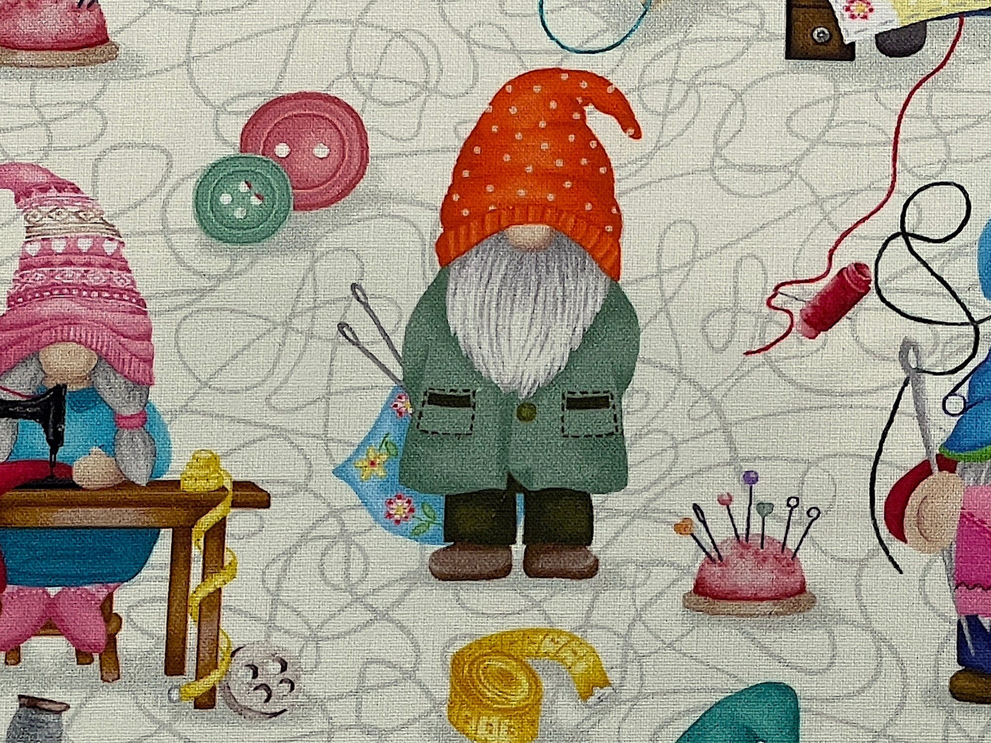 Close up of a gnome with a red hat.