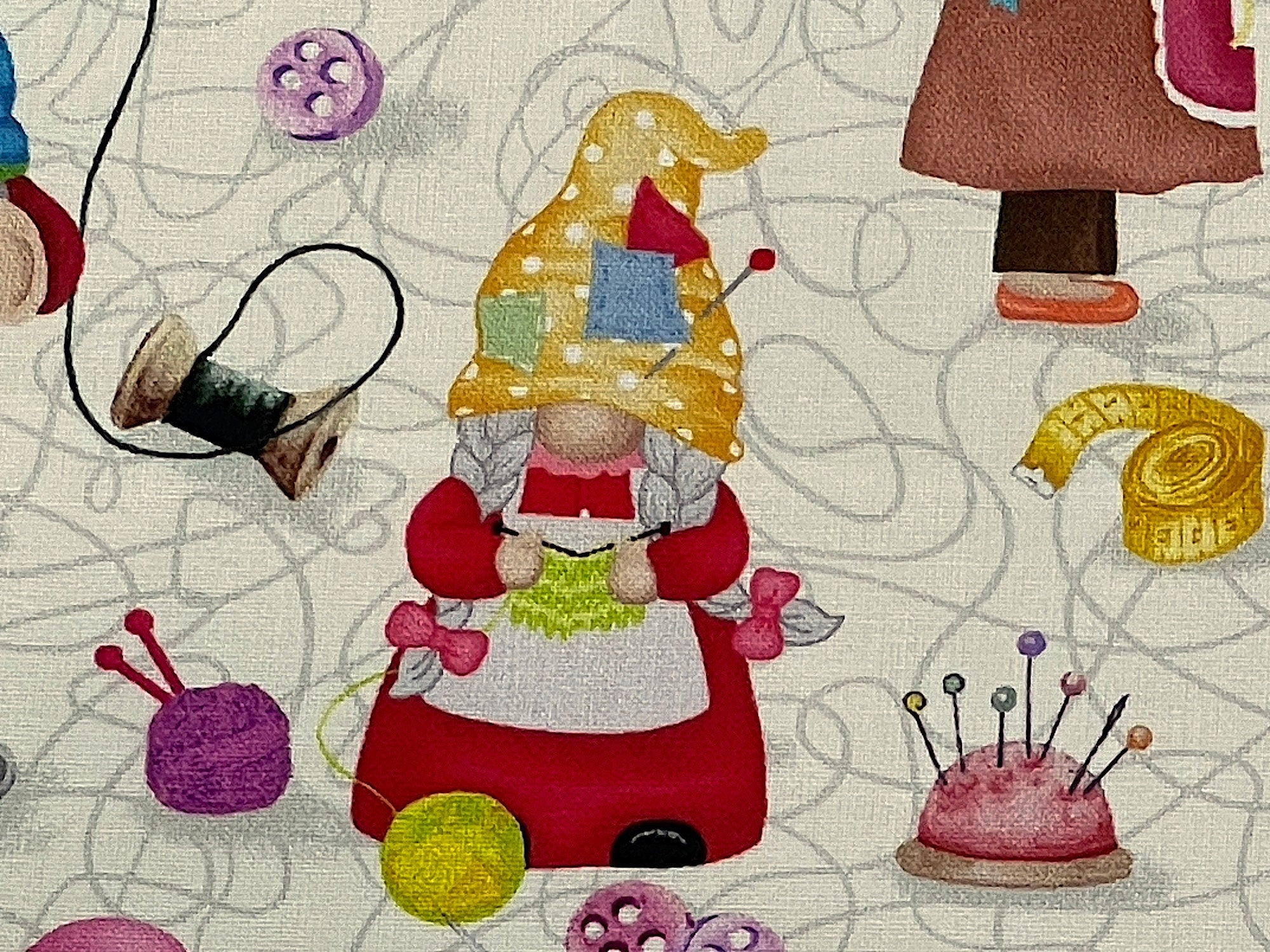Close up of a gnome crocheting.